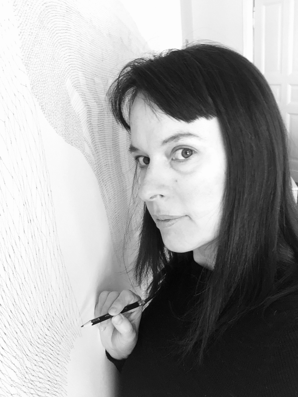 Kathrin Bauer working on the walldrawing 